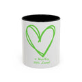 "Loved to the Core" Ceramic Mug — Green Heart Accent (11oz & 15oz)